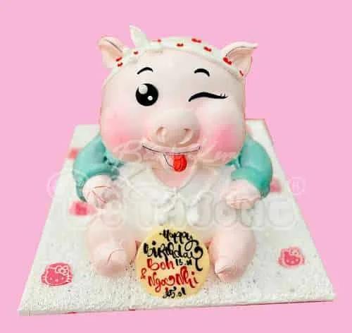 bánh kem con heo bé gái thôi nôi đầy tháng